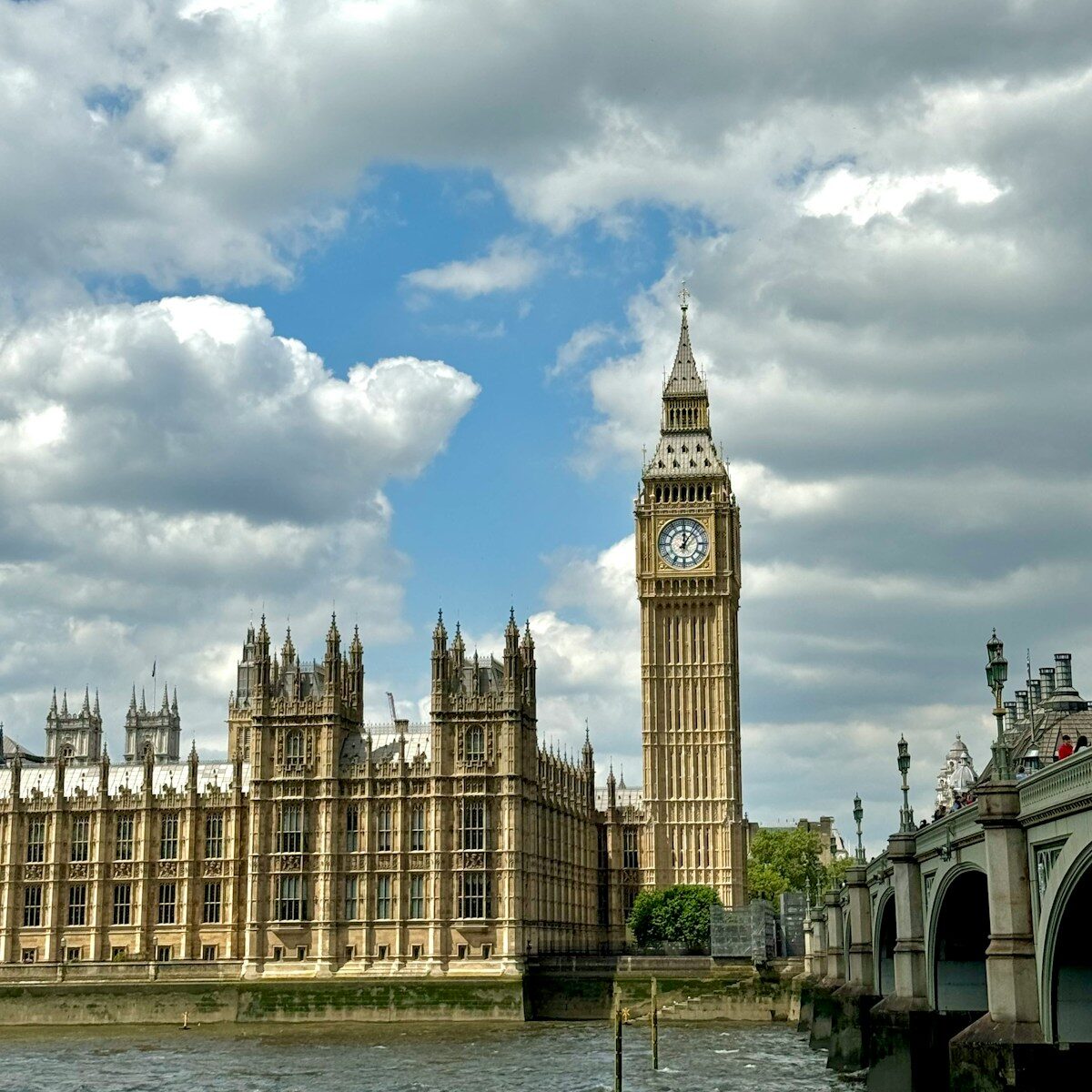 a large clock tower towering over a city