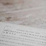 alphabets for school work on table