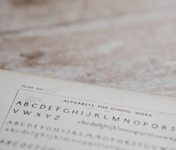 alphabets for school work on table