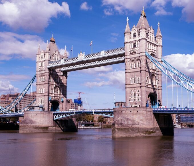 gray concrete bridge under blue sky during daytime