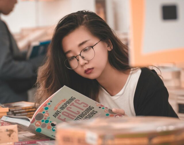 woman reading book
